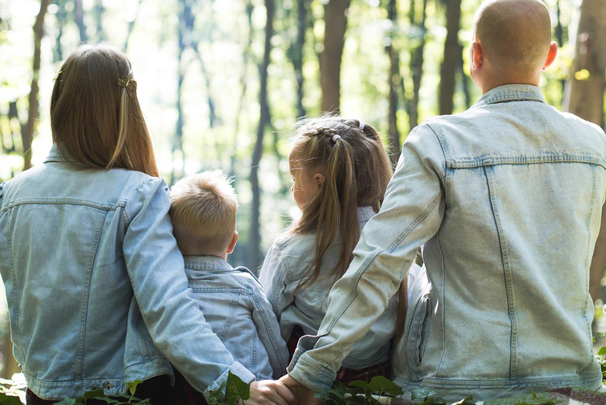 family togetherness in the woods, showing the goal of family therapy